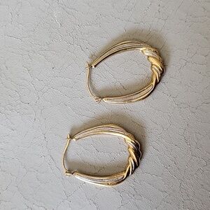 14k Yellow Gold stamped Hoop Earrings with Textured Details and white gold.